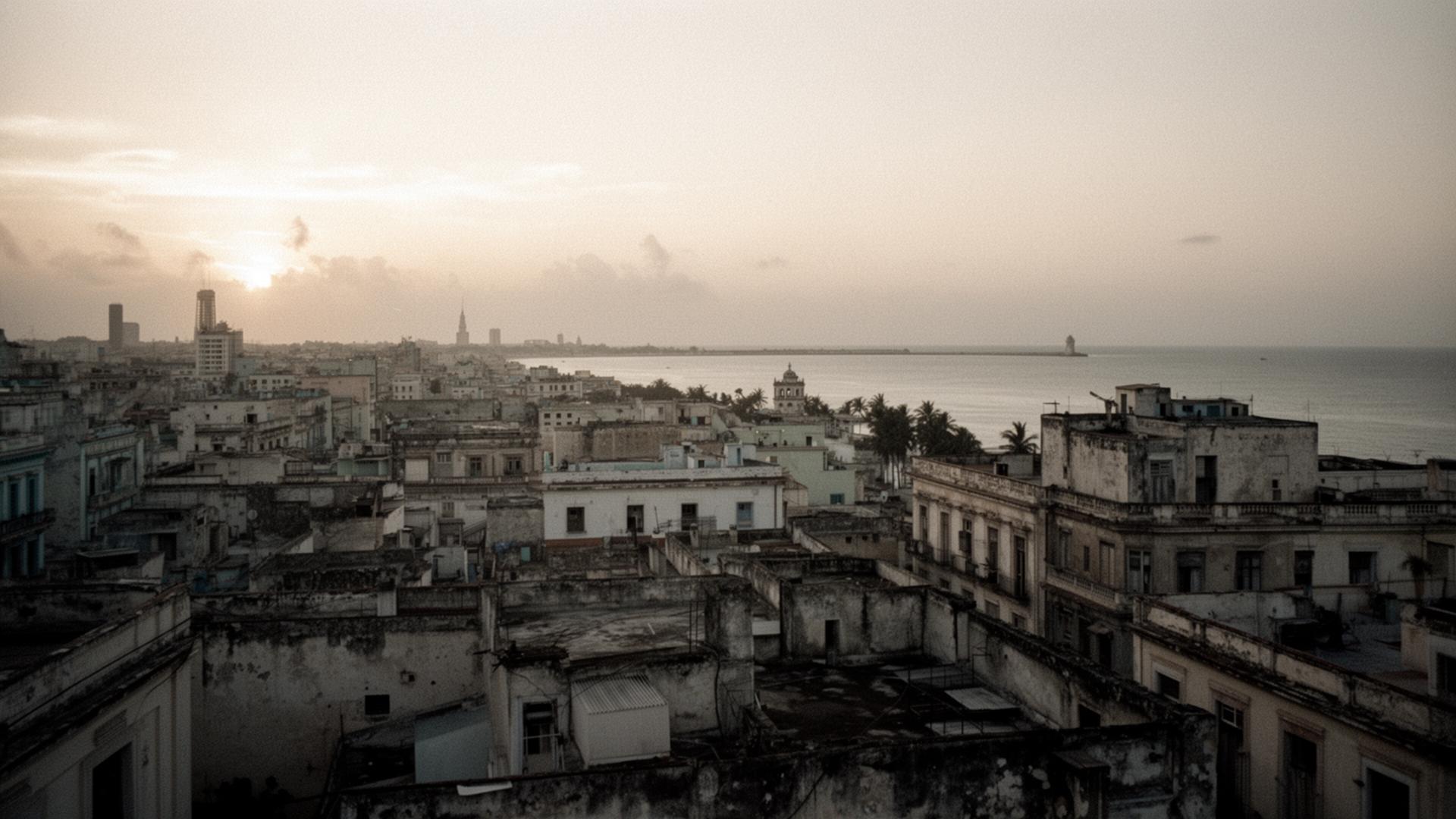 Havana rooftops at dawn, looking out toward the Malecón